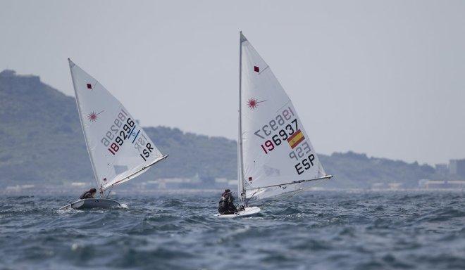 Oren Jacob, ISR, Women's One Person Dinghy (Laser Radial) and Yolanda Luque Gonzalez, ESP, Women's One Person Dinghy (Laser Radial) at day two - 2015 ISAF Sailing WC Weymouth and Portland © onEdition http://www.onEdition.com